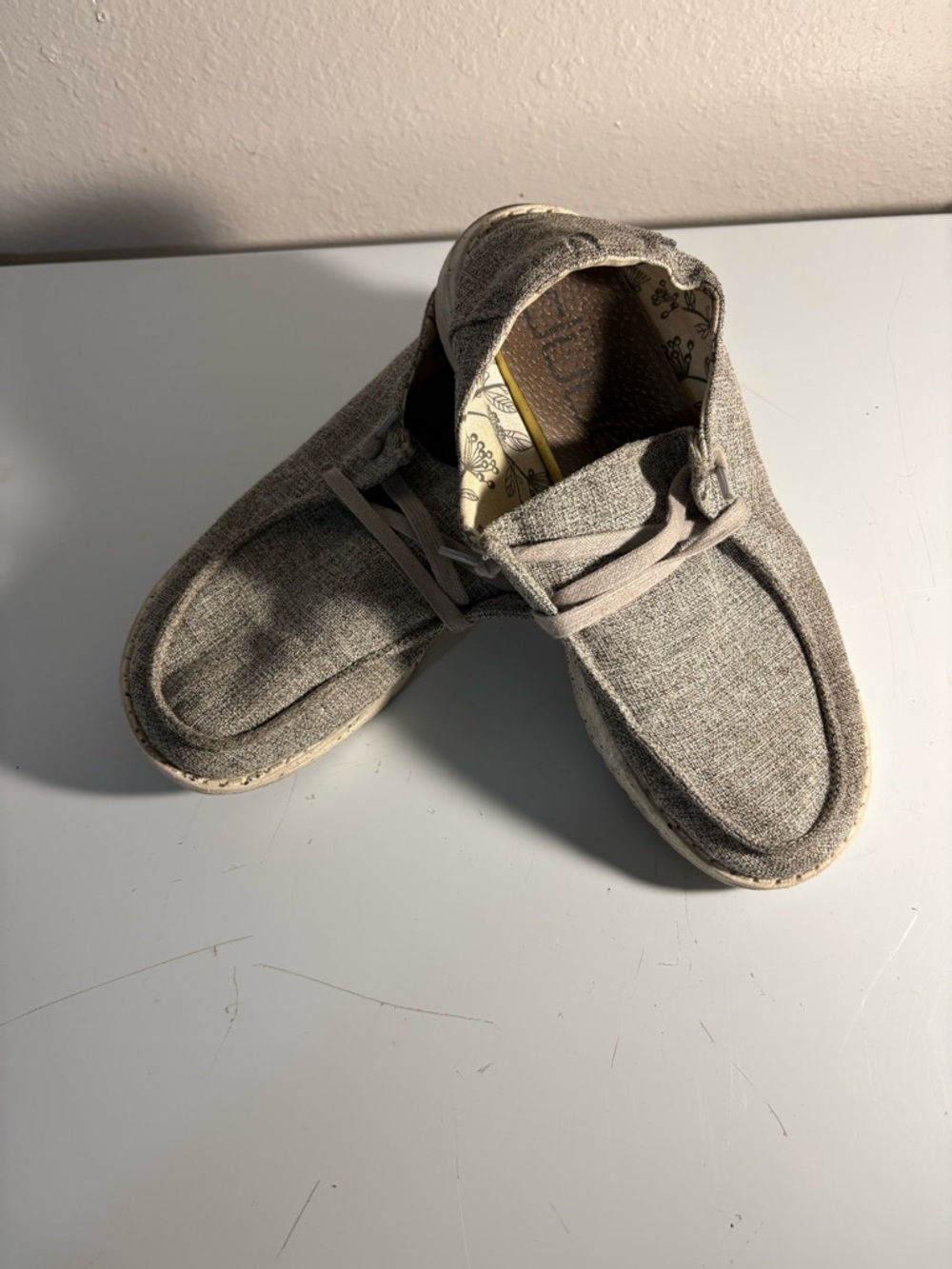Woman’s Hey dudes slip on shoes in light grey